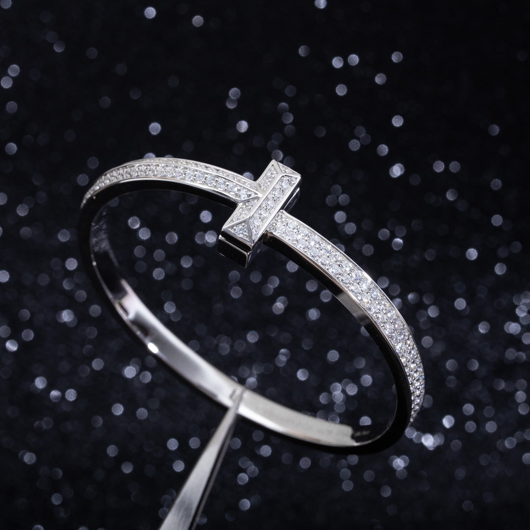 Tiffany Wide Cubic Zirconia Hinged Bangle Silver